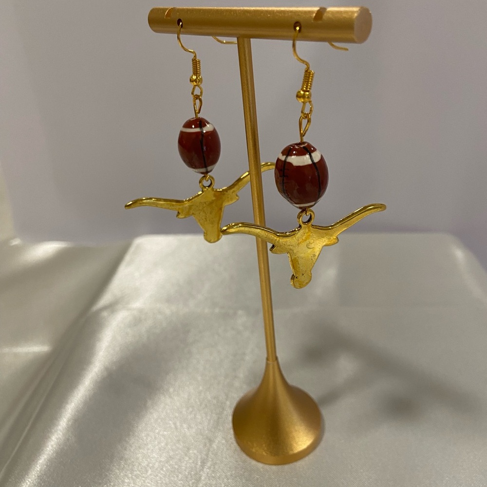 Gold Longhorn Earrings with Red Accents